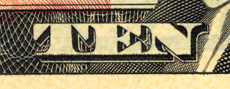Extreme closeup of “TEN” on US$10 note