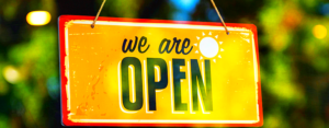 Orange Open Sign on Window